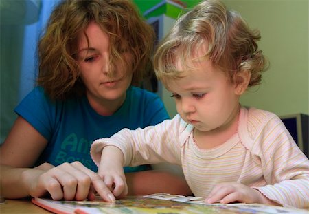 A mother is teaching her child. Stock Photo - Budget Royalty-Free & Subscription, Code: 400-05034582