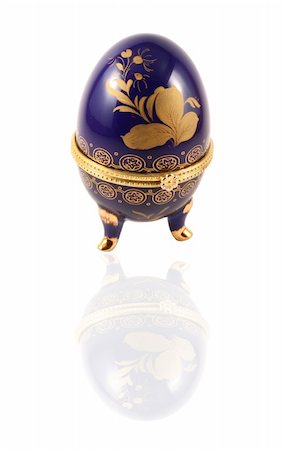 Dark blue easter egg isolated on a white background Stock Photo - Budget Royalty-Free & Subscription, Code: 400-05035711