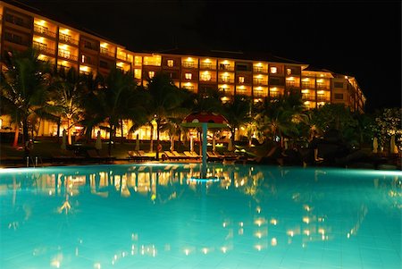 swimming pool night palm tree - Tropical pool in luxury hotel at night Stock Photo - Budget Royalty-Free & Subscription, Code: 400-05032889