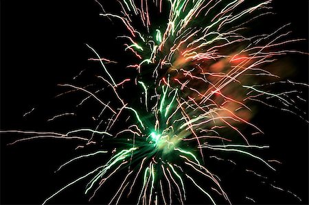 simsearch:400-04219011,k - Colorful fireworks celebration against dark sky at night Stock Photo - Budget Royalty-Free & Subscription, Code: 400-05045635