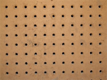 peg - peg board with holes for organizing tools in the workshop Stock Photo - Budget Royalty-Free & Subscription, Code: 400-05047303
