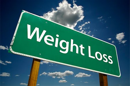 Weight Loss - Road Sign. On dramatic blue sky and clouds background. Stock Photo - Budget Royalty-Free & Subscription, Code: 400-05048201