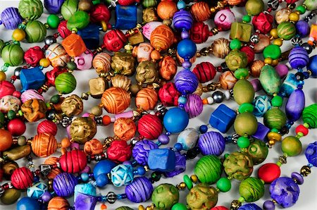 Detail of many colorful clay necklace beads Stock Photo - Budget Royalty-Free & Subscription, Code: 400-05048661