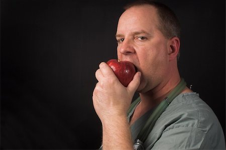 food specialist - An apple a day keeps the doctor away. Photographie de stock - Aubaine LD & Abonnement, Code: 400-05043318