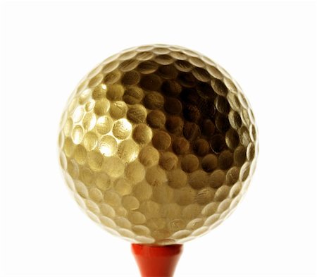 peg - Golfball in gold for luxury play Stock Photo - Budget Royalty-Free & Subscription, Code: 400-05043904