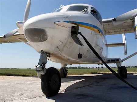 photos planes refueling airports - Refueling of An-28 at the airfield Stock Photo - Budget Royalty-Free & Subscription, Code: 400-05055150