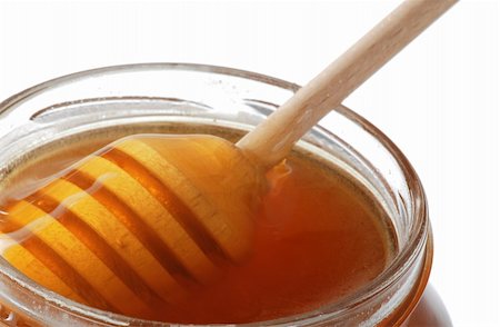 simsearch:400-05135233,k - Honeyspoon in the jar full of honey. Shallow DOF Foto de stock - Super Valor sin royalties y Suscripción, Código: 400-05057150