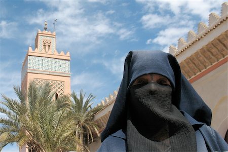 A veiled, Muslim lady in front of a Mosque. Stock Photo - Budget Royalty-Free & Subscription, Code: 400-05057264