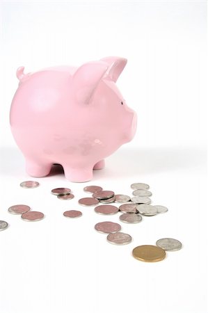 simsearch:400-06077471,k - Pink Piggy Bank on isoalted on white background with coins Stock Photo - Budget Royalty-Free & Subscription, Code: 400-05057603