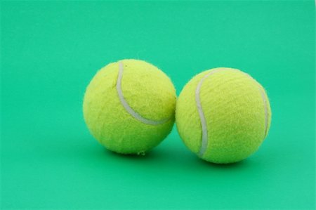 simsearch:400-04833689,k - two tennis balls on green Stock Photo - Budget Royalty-Free & Subscription, Code: 400-05057627