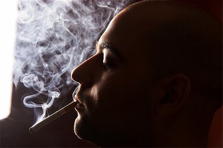 simsearch:400-05207678,k - close up of an smoking man Stock Photo - Budget Royalty-Free & Subscription, Code: 400-05058425
