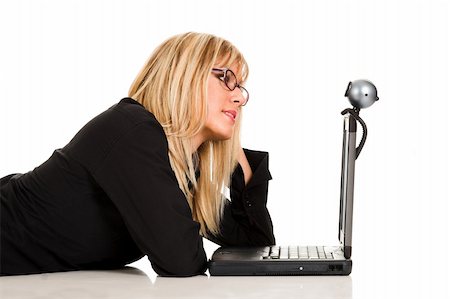 A businesswoman using laptop and webcam Stock Photo - Budget Royalty-Free & Subscription, Code: 400-05058548