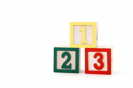 simsearch:600-02346205,k - three alphabet blocks with number one, two and three over a white surface Stock Photo - Budget Royalty-Free & Subscription, Code: 400-05051780