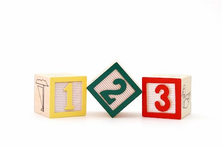 simsearch:600-02346205,k - wood toy blocks with numbers on a white surface Stock Photo - Budget Royalty-Free & Subscription, Code: 400-05052040