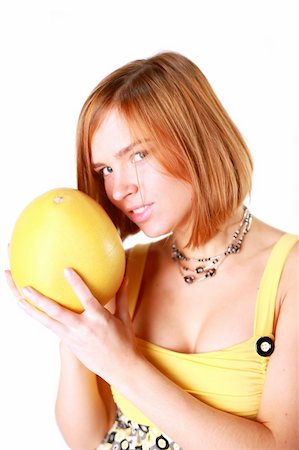 simsearch:400-05062363,k - Girl holds in really big citrus fruit - pamelo Stock Photo - Budget Royalty-Free & Subscription, Code: 400-05052499