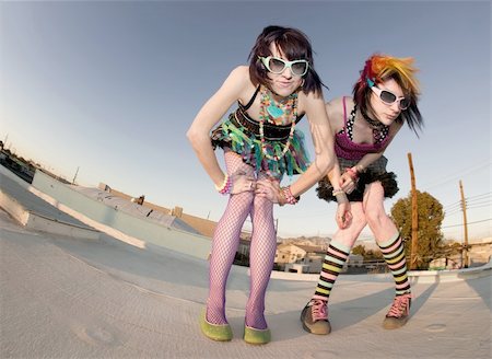 simsearch:400-04016564,k - Fisheye shot of girls in brightly colored clothing on a roof Stock Photo - Budget Royalty-Free & Subscription, Code: 400-05053879