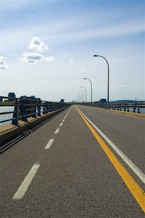 ramps on the road - A bicycle lane on a very long bridge, portrait orientation Stock Photo - Budget Royalty-Free & Subscription, Code: 400-05065431