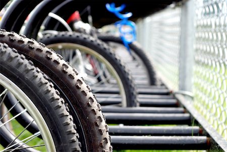 riding crop - Elementary school yard bicycle rack with shallow focus Stock Photo - Budget Royalty-Free & Subscription, Code: 400-05065758