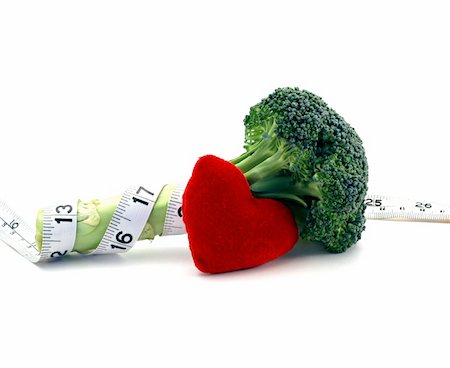 Fresh broccoli healthy heart and lifestyle concept over a white background Stock Photo - Budget Royalty-Free & Subscription, Code: 400-05065763