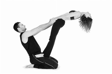 Male and female gymnasts practicing a complex double yoga pose. Stock Photo - Budget Royalty-Free & Subscription, Code: 400-05067573