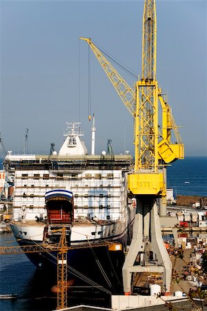 Large cruise-ferry under construction in a shipyard with open sea in the background Stock Photo - Budget Royalty-Free & Subscription, Code: 400-05068029
