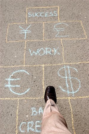 Man playing a business hopscotch Stock Photo - Budget Royalty-Free & Subscription, Code: 400-05068311