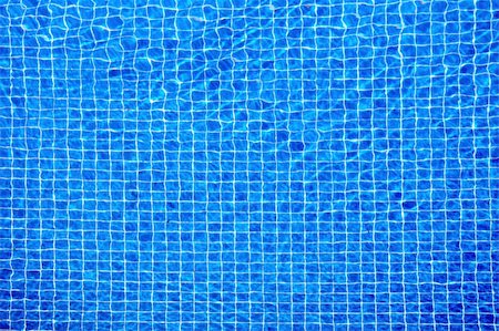 View of nice blue swimming pool water surface Stock Photo - Budget Royalty-Free & Subscription, Code: 400-05062687