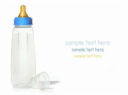 simsearch:400-06751007,k - Baby bottle isolated against white background Stock Photo - Budget Royalty-Free & Subscription, Code: 400-05074543