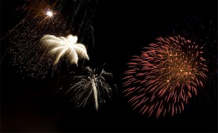 simsearch:400-04219011,k - Fireworks being set off against a dark sky Stock Photo - Budget Royalty-Free & Subscription, Code: 400-05079609