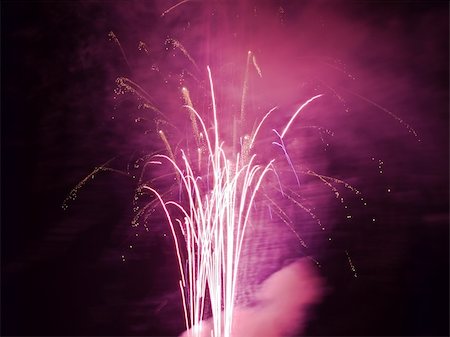 simsearch:400-04573554,k - Fireworks rockets exploding against dark sky. Stock Photo - Budget Royalty-Free & Subscription, Code: 400-05079765