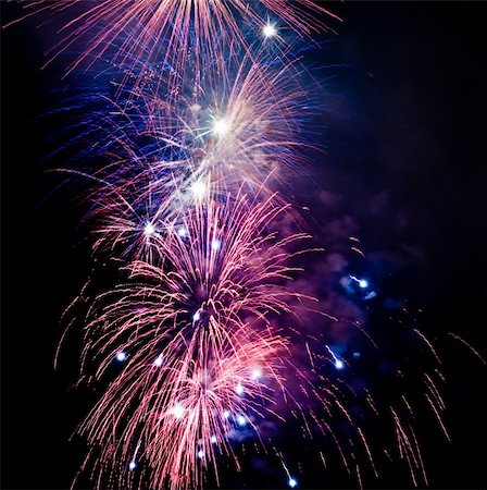 simsearch:400-04573554,k - Fireworks rockets exploding against dark sky. Stock Photo - Budget Royalty-Free & Subscription, Code: 400-05079766