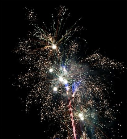 simsearch:400-04573554,k - Fireworks rockets exploding against dark sky. Stock Photo - Budget Royalty-Free & Subscription, Code: 400-05079777