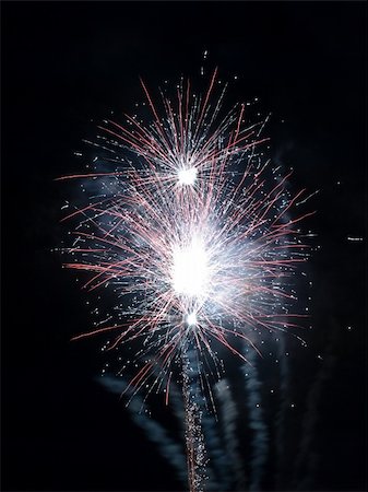 simsearch:400-04573554,k - Fireworks rockets exploding against dark sky. Stock Photo - Budget Royalty-Free & Subscription, Code: 400-05079779