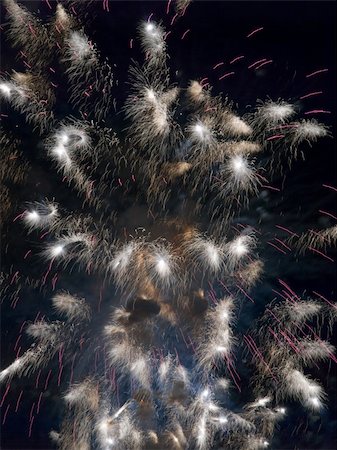 simsearch:400-04573554,k - Fireworks rockets exploding against dark sky. Stock Photo - Budget Royalty-Free & Subscription, Code: 400-05079795