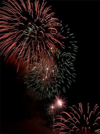 simsearch:400-04573554,k - Fireworks rockets exploding against dark sky. Stock Photo - Budget Royalty-Free & Subscription, Code: 400-05079798