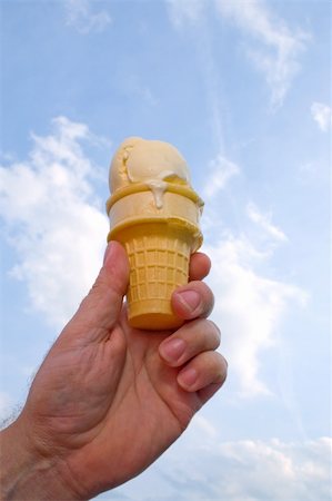 simsearch:400-05718903,k - A delicious vanilla ice cream cone on a hot day. Stock Photo - Budget Royalty-Free & Subscription, Code: 400-05070530
