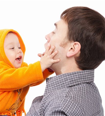 Baby girl playing with dad, isolated Stock Photo - Budget Royalty-Free & Subscription, Code: 400-05087344