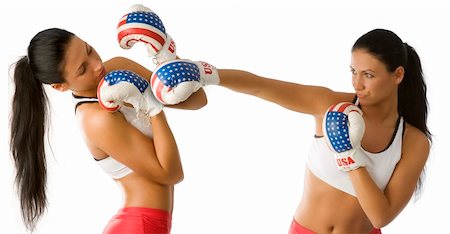 simsearch:400-04970057,k - twins nice young women in boxing dress in act to fight Stock Photo - Budget Royalty-Free & Subscription, Code: 400-05088775