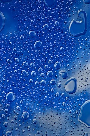 simsearch:400-04822803,k - Some rain drops on my window after a strong rain against the blue sky Stock Photo - Budget Royalty-Free & Subscription, Code: 400-05089545