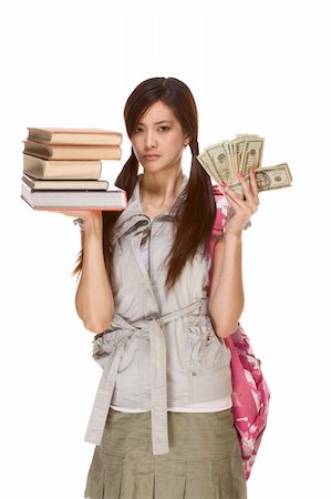 simsearch:400-04408371,k - Asian college student with backpack balance pile of books and money in here hands with very concerned expression Stock Photo - Budget Royalty-Free & Subscription, Code: 400-05081044