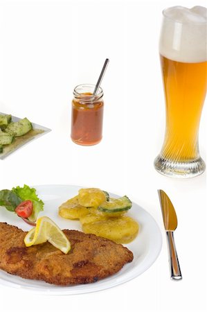 closeup of a  Viennese escalope (Wiener Schnitzel) Stock Photo - Budget Royalty-Free & Subscription, Code: 400-05094118