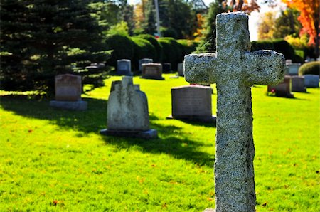 simsearch:400-04032243,k - Bright graveyard lawn with ancient tombstone crosses Stock Photo - Budget Royalty-Free & Subscription, Code: 400-05094717