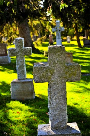 simsearch:400-04032243,k - Bright graveyard lawn with ancient tombstone crosses Stock Photo - Budget Royalty-Free & Subscription, Code: 400-05094720