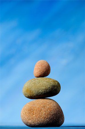 simsearch:400-04915648,k - Stack of stones on a blue background Stock Photo - Budget Royalty-Free & Subscription, Code: 400-05095471