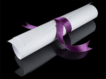 simsearch:400-04408371,k - Diploma with a violet silk ribbon, isolated on black background. Stock Photo - Budget Royalty-Free & Subscription, Code: 400-05095503