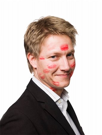 red lipstick marks - Man with lipstickmarks in his face Stock Photo - Budget Royalty-Free & Subscription, Code: 400-05098618