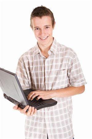 simsearch:400-04704759,k - casual teenager with laptop. over white background Stock Photo - Budget Royalty-Free & Subscription, Code: 400-05098792