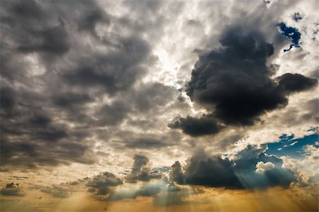 Cloudscape with sun ray shining through. Stock Photo - Budget Royalty-Free & Subscription, Code: 400-05090146