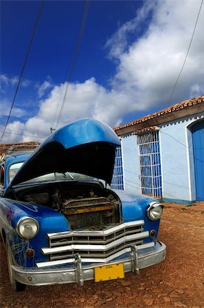 A view of vintage classic car in rural street, Trinidad town, cuba Stock Photo - Budget Royalty-Free & Subscription, Code: 400-05092646