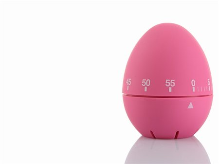 Pink egg timer isolated on white background Stock Photo - Budget Royalty-Free & Subscription, Code: 400-05092941